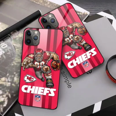 Kansas City Chiefs Gridiron Fury Phone Case on table